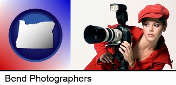 a female photographer with a camera and a tripod in Bend, OR