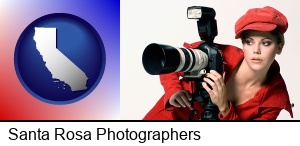 Santa Rosa, California - a female photographer with a camera and a tripod