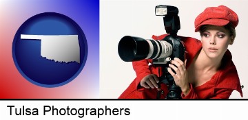 a female photographer with a camera and a tripod in Tulsa, OK