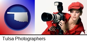 Tulsa, Oklahoma - a female photographer with a camera and a tripod