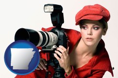 arkansas a female photographer with a camera and a tripod