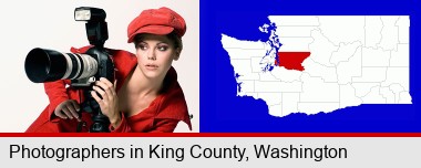 a female photographer with a camera and a tripod; King County highlighted in red on a map