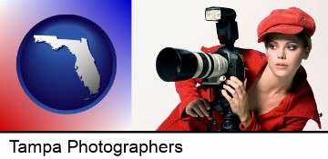 a female photographer with a camera and a tripod in Tampa, FL