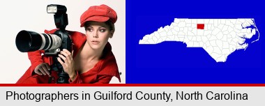 a female photographer with a camera and a tripod; Guilford County highlighted in red on a map