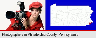 a female photographer with a camera and a tripod; Philadelphia County highlighted in red on a map